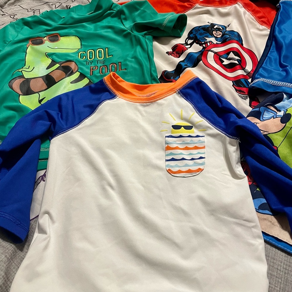 Toddler boys swim lot. 2T